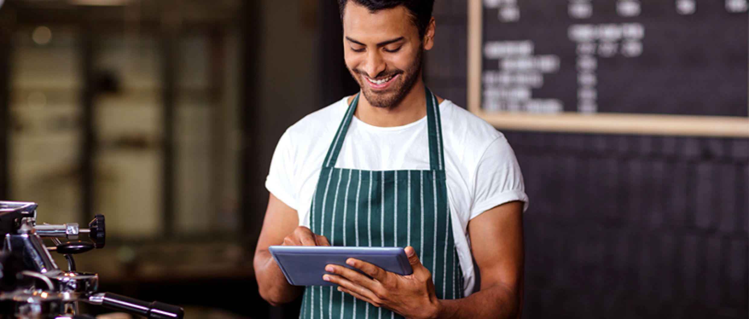 Barista using a tablet