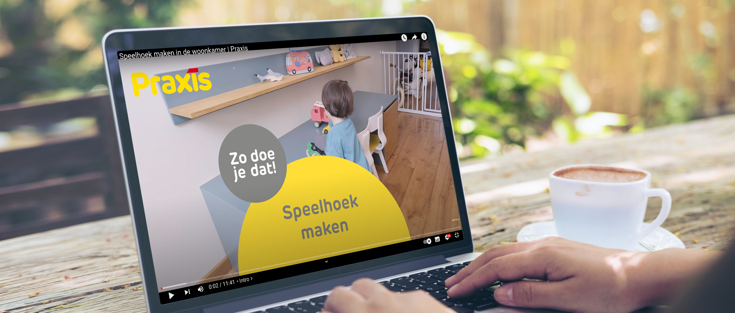 Laptop playing a Youtube video from Praxis
