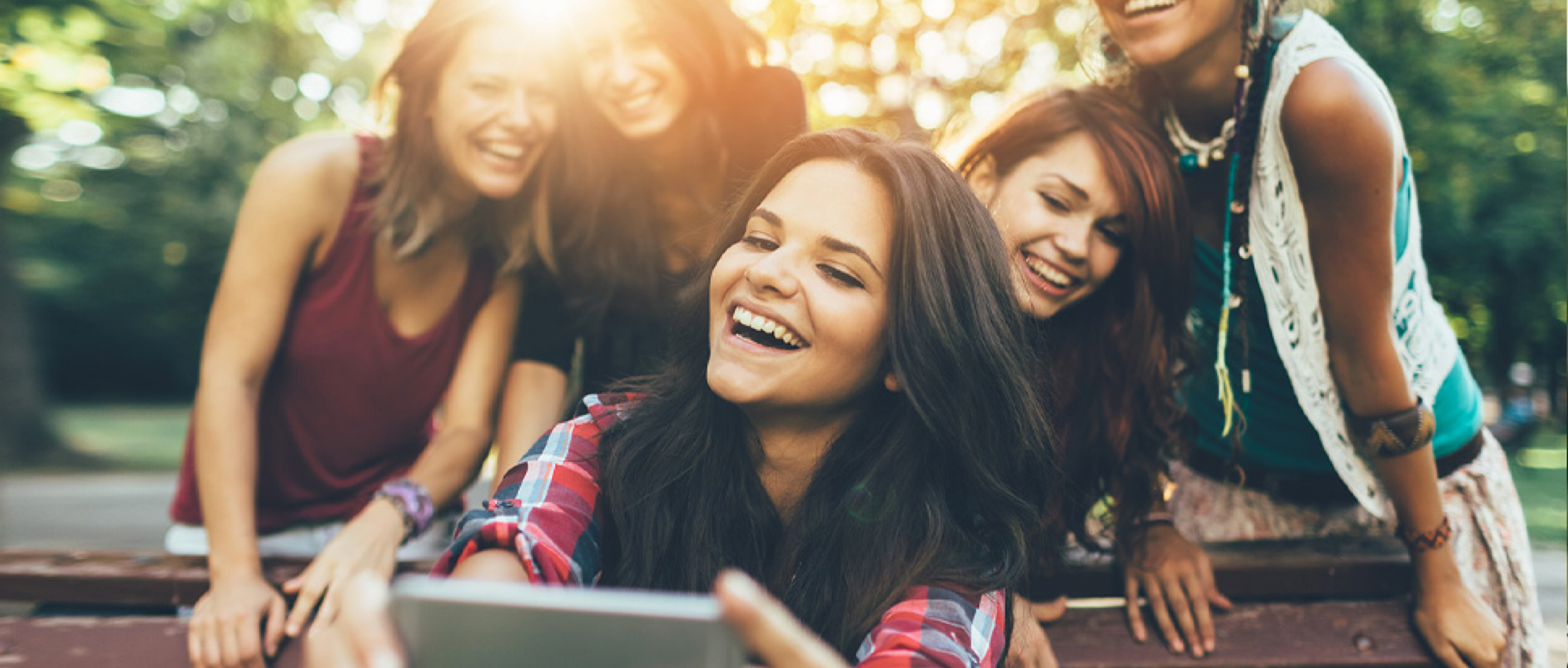 A group of young people taking a selfie