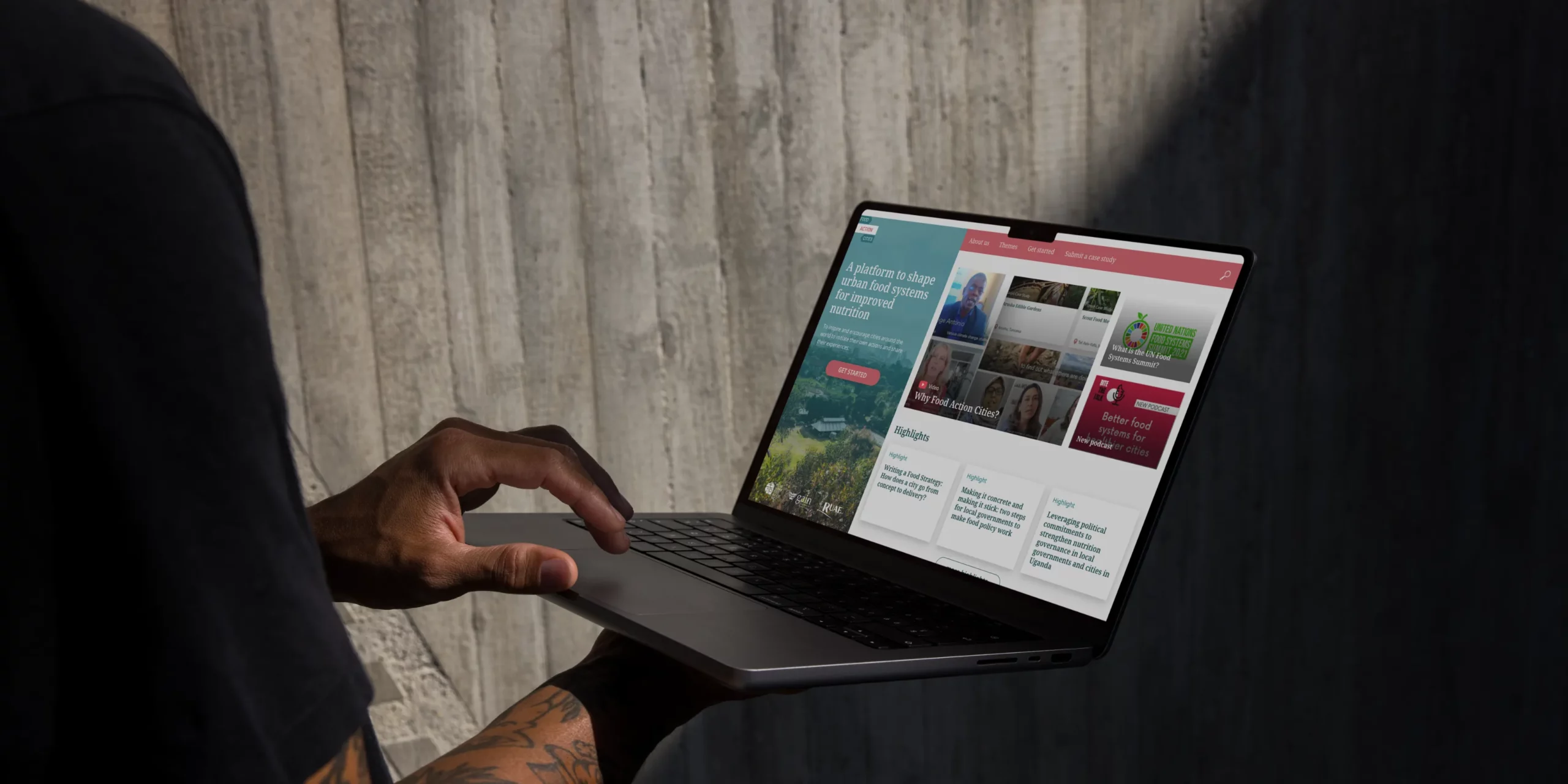 Laptop mockup showing Food-Action-Cities website