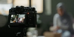 Camera taking picture of a woman