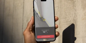 Phone mockup showing Praxis Ai floor calculator