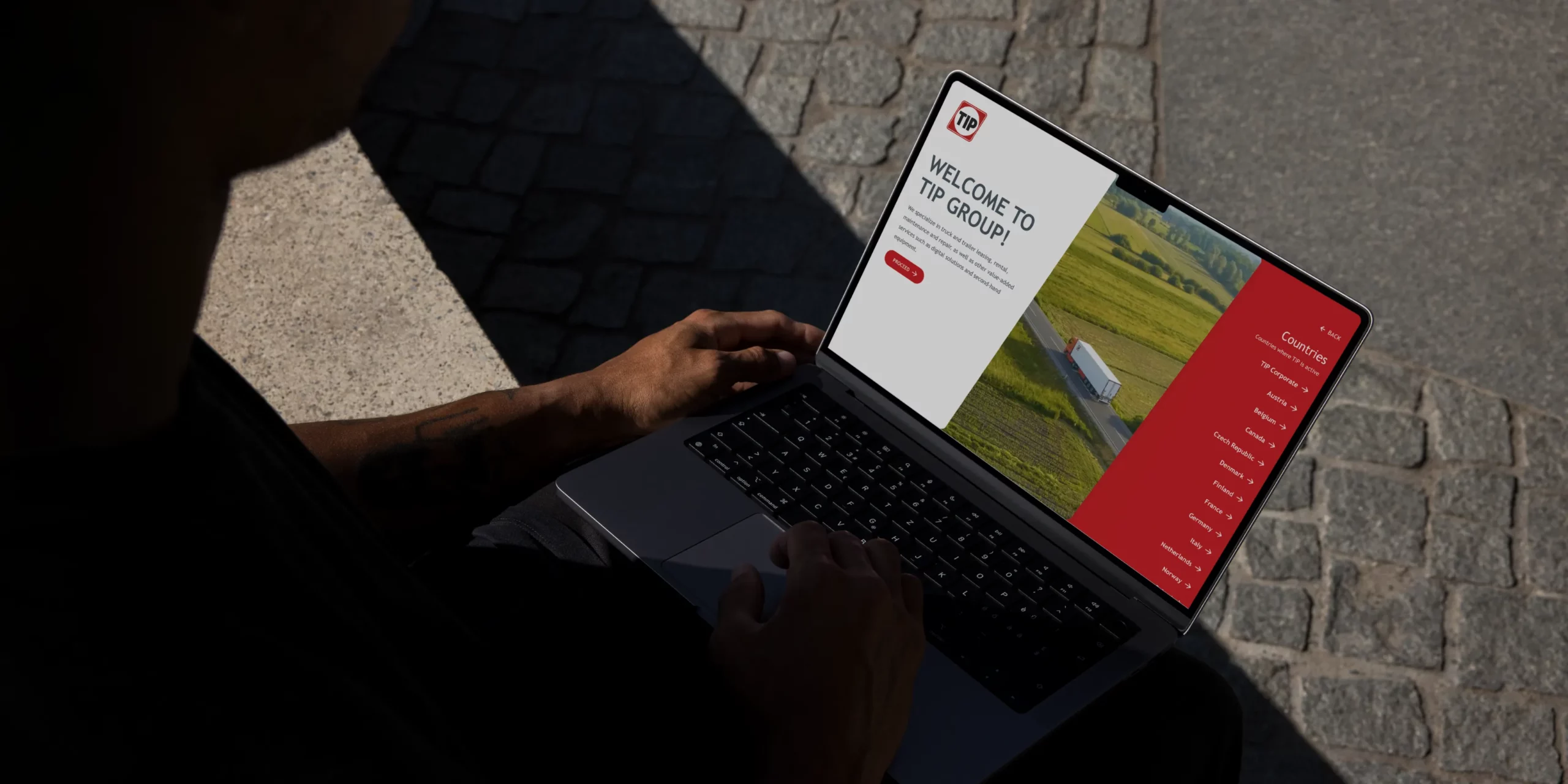 laptop mockup showing TIP website