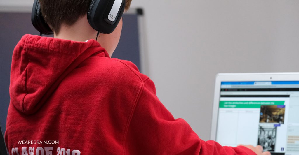 Picture of a kid using a laptop