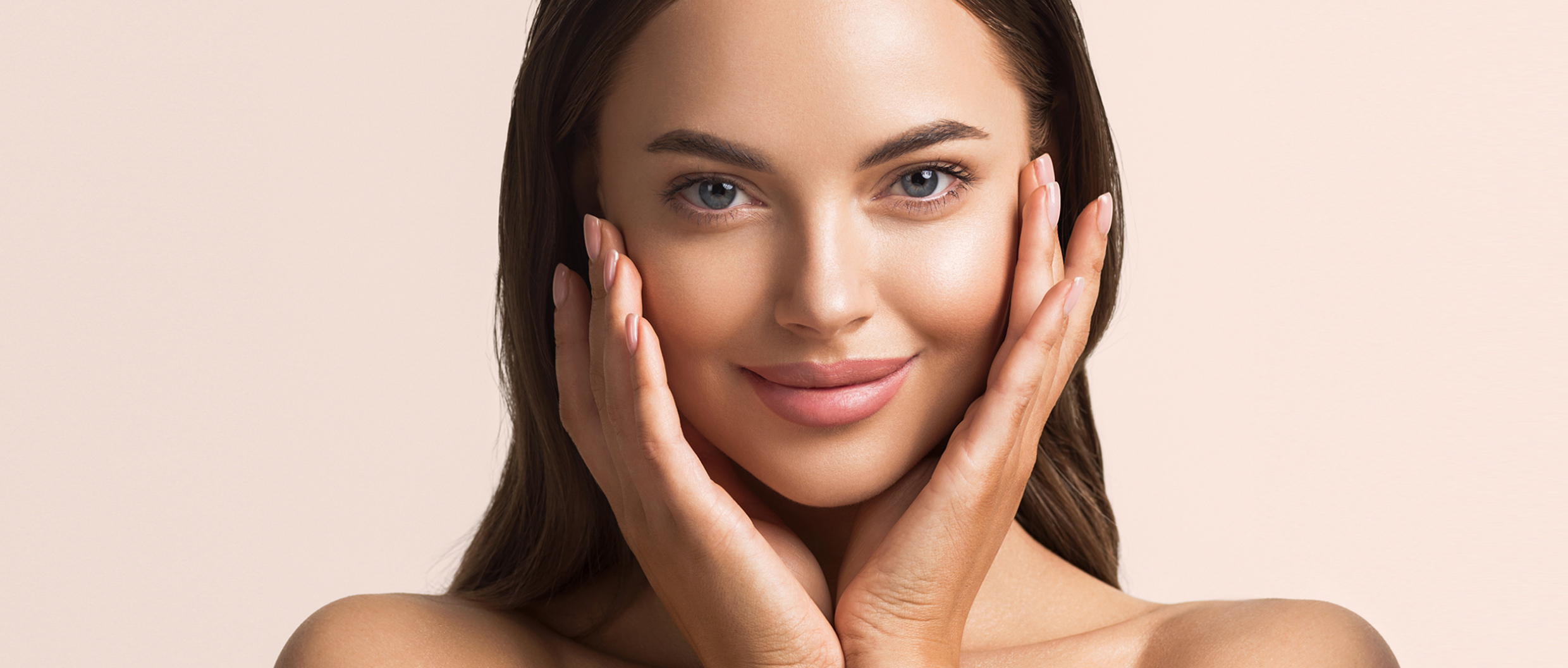 A women holding her hands on her face