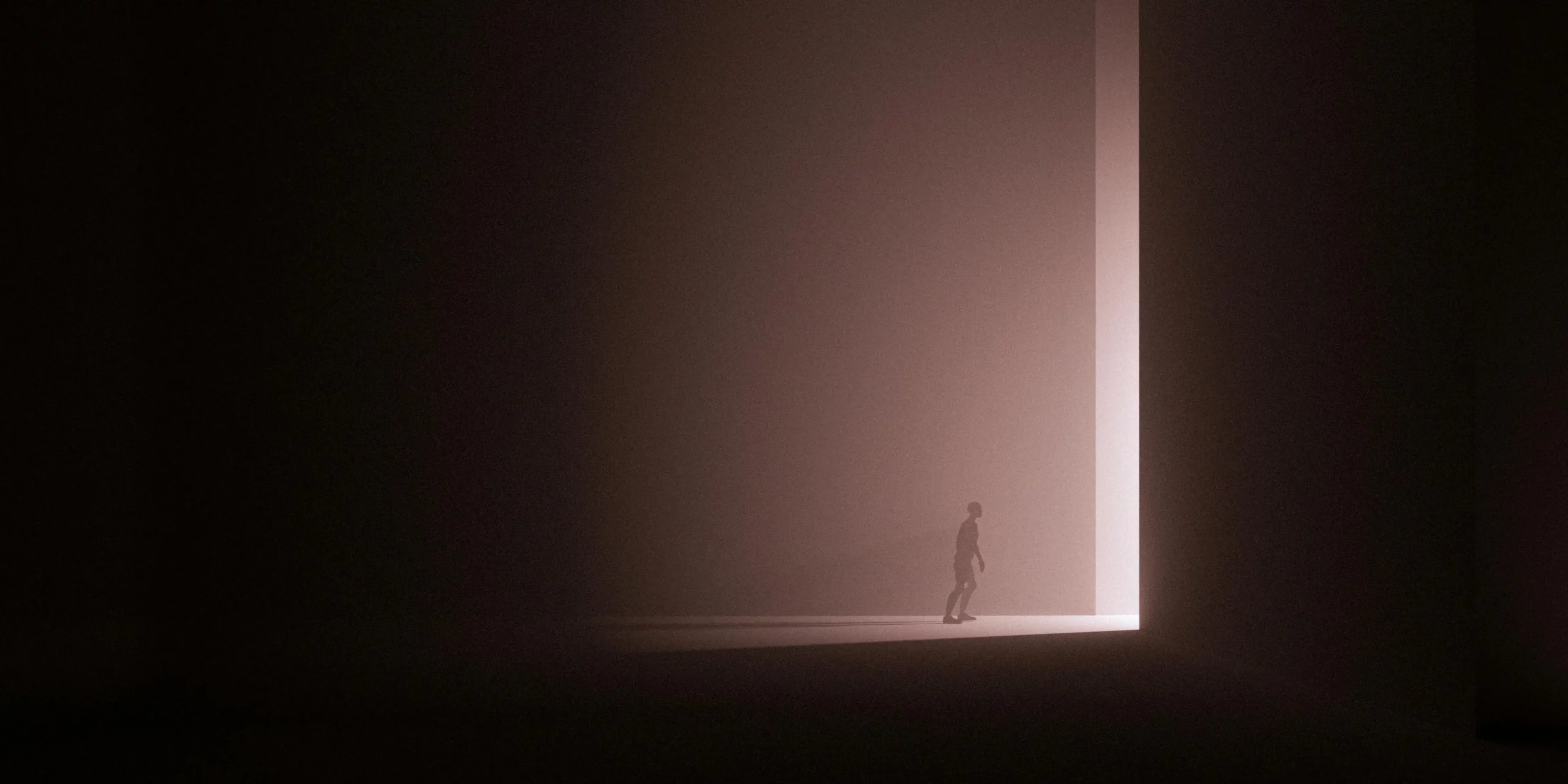 Person in front of a giant door
