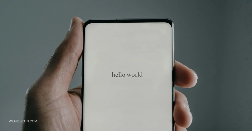 smartphone screen displaying the words hello world