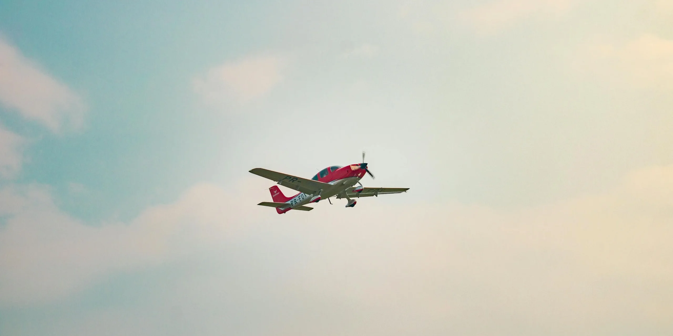 Photograph of a small plane flying