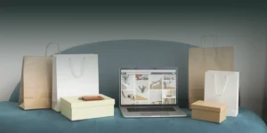 Photo of shopping bags and an open laptop on a sofa