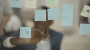 Person brainstorming with sticky notes